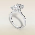 Radiant Hidden Halo Cathedral engagement ring in white gold, angled view