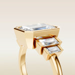 Emerald Five Stone Full Bezel engagement ring in yellow gold, basket close up