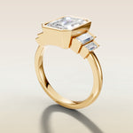 Emerald Five Stone Full Bezel engagement ring in yellow gold, angled side view