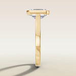 Emerald Full Bezel Cathedral engagement ring in gold, side profile