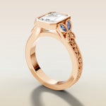 Emerald Full Bezel Floral Engraved engagement ring in rose gold, angled side view
