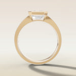 Emerald Full Bezel Low Profile engagement ring in yellow gold, front view
