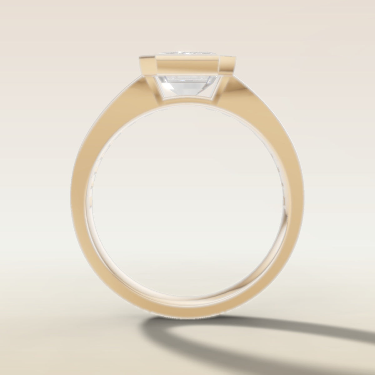 Emerald Full Bezel Low Profile engagement ring in yellow gold, front view