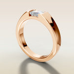 Emerald Half Bezel Low Profile engagement ring in rose gold, angled side view