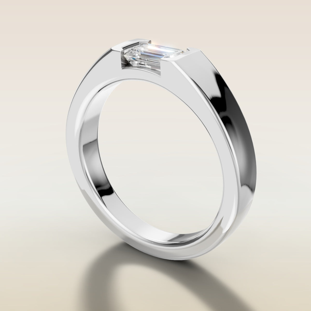Emerald Half Bezel Low Profile engagement ring in white gold, angled side view