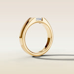 Emerald Half Bezel Low Profile engagement ring in gold, angled side view