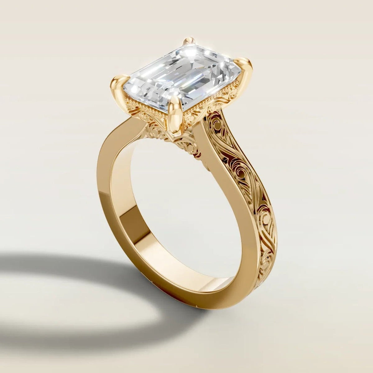 Emerald Hand Engraved engagement ring in yellow gold, angled side view