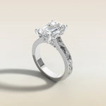 Emerald Hand Engraved engagement ring in white gold, angled side view