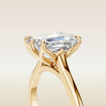 Emerald Six Petal Tulip engagement ring in yellow gold, basket close up