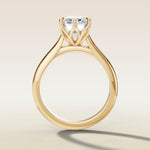 Emerald Six Petal Tulip engagement ring in yellow gold, front view