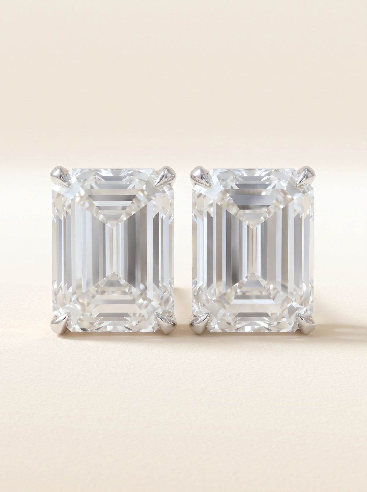 Emerald cut diamond stud earrings in 14K white gold