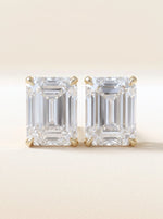 Emerald cut diamond stud earrings in 14K yellow gold