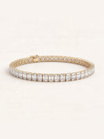 Emerald shaped diamond tennis bracelet in 14K yellow gold