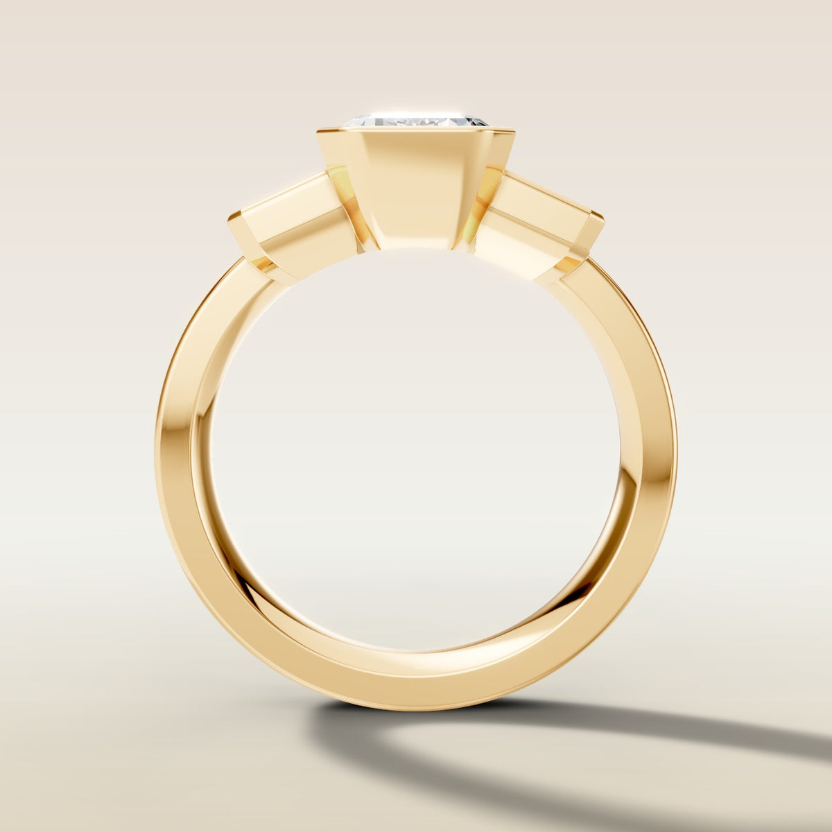Emerald Three Stone Half Bezel Thick Band engagement ring in yellow gold, front view