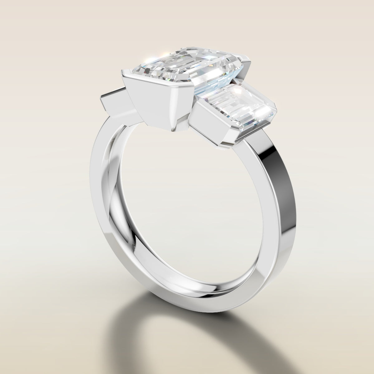 Emerald Three Stone Half Bezel Thick Band engagement ring in white gold, angled side view
