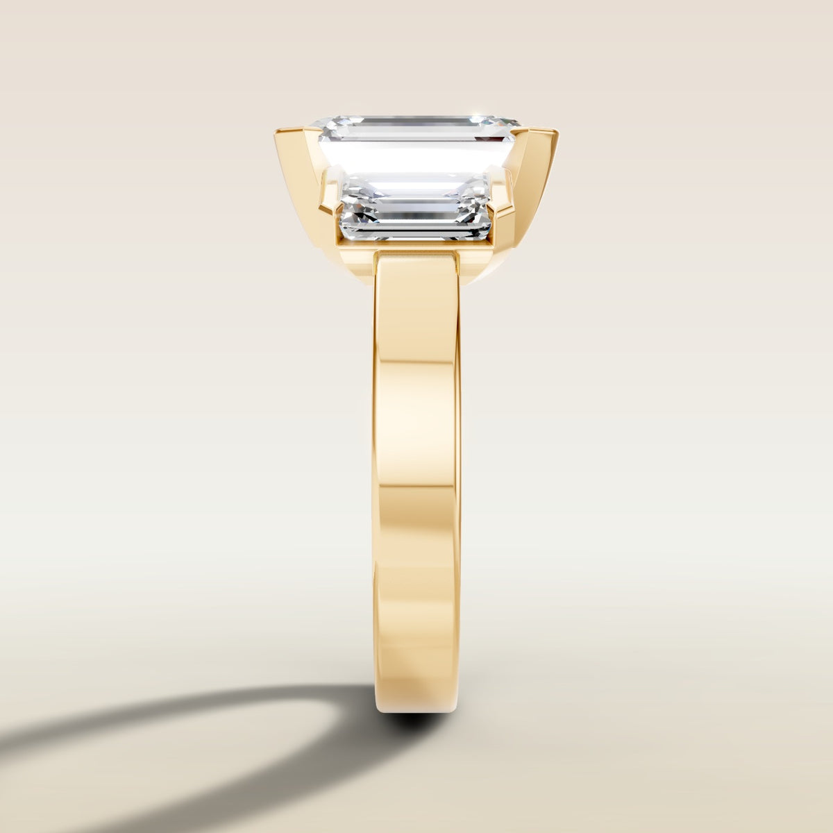 Emerald Three Stone Half Bezel Thick Band engagement ring in yellow gold, side profile