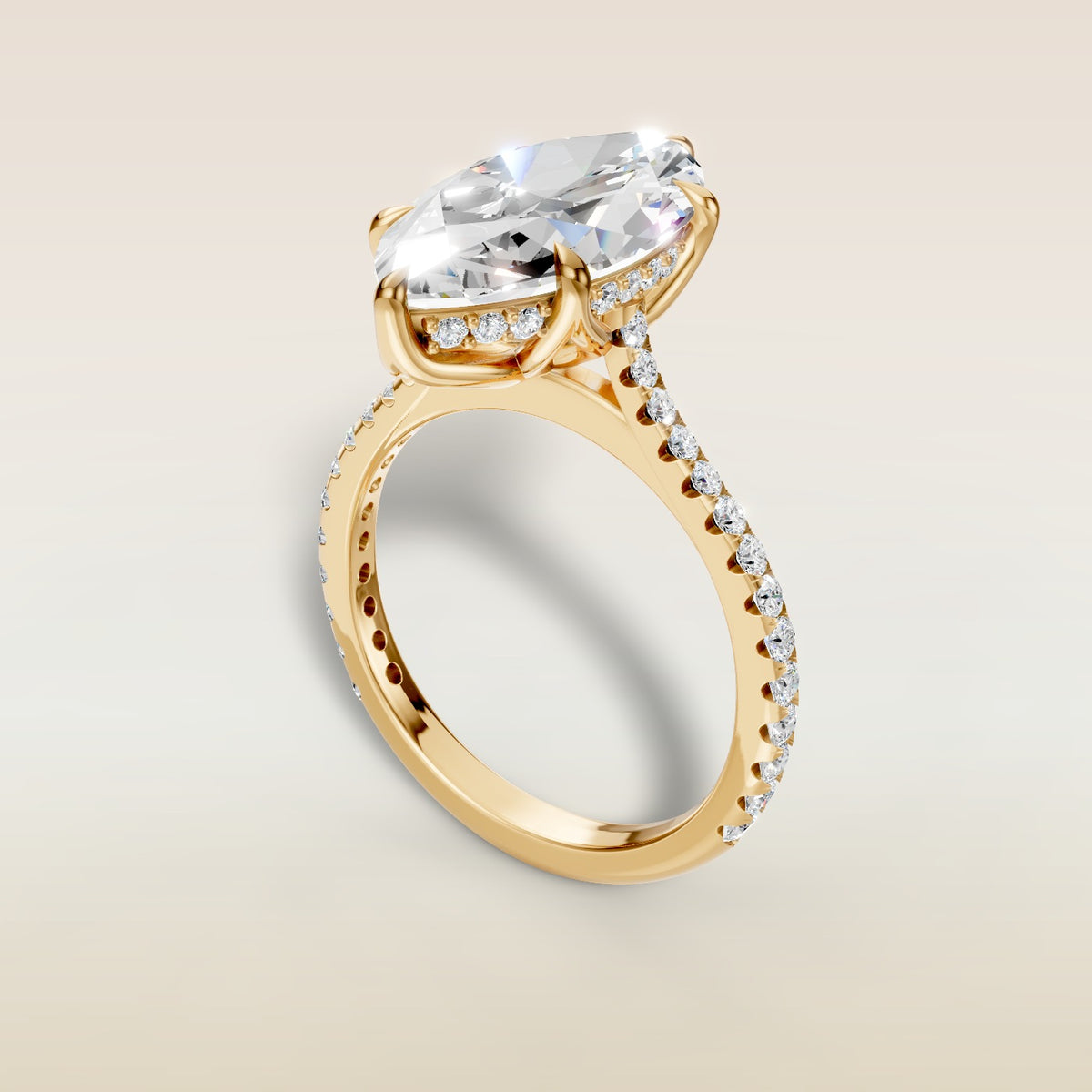 Marquise Tulip Hidden Halo Pave engagement ring in yellow gold, angled view