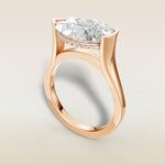 Pear Half Bezel with Hidden Halo engagement ring in rose gold, angled view