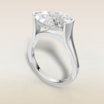 Pear Half Bezel with Hidden Halo engagement ring in white gold, angled view