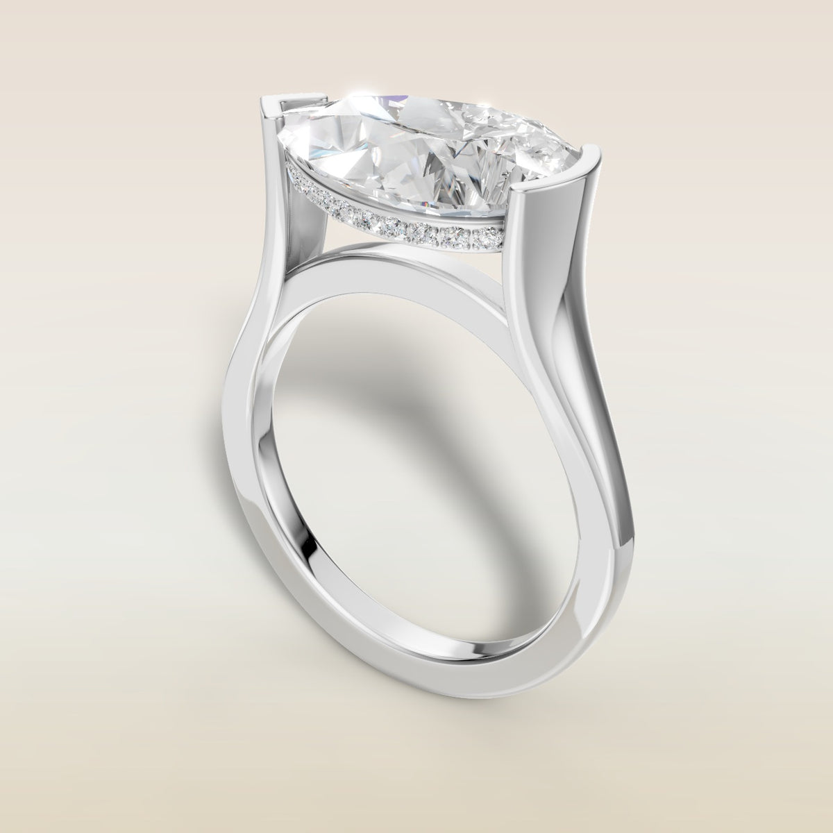 Pear Half Bezel with Hidden Halo engagement ring in white gold, angled view