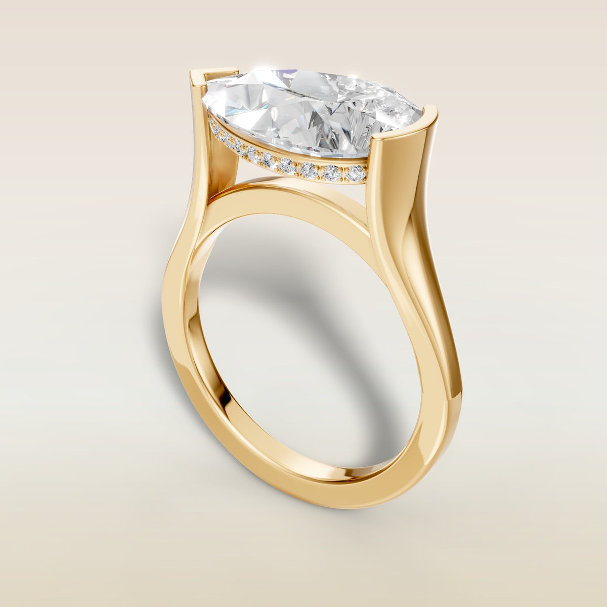 Pear Half Bezel with Hidden Halo engagement ring in yellow gold, angled view
