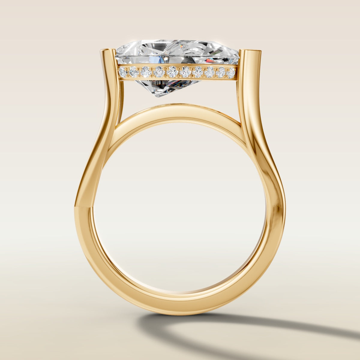 Pear Half Bezel with Hidden Halo engagement ring in yellow gold, front view