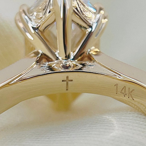 Cross engraving, inside the band