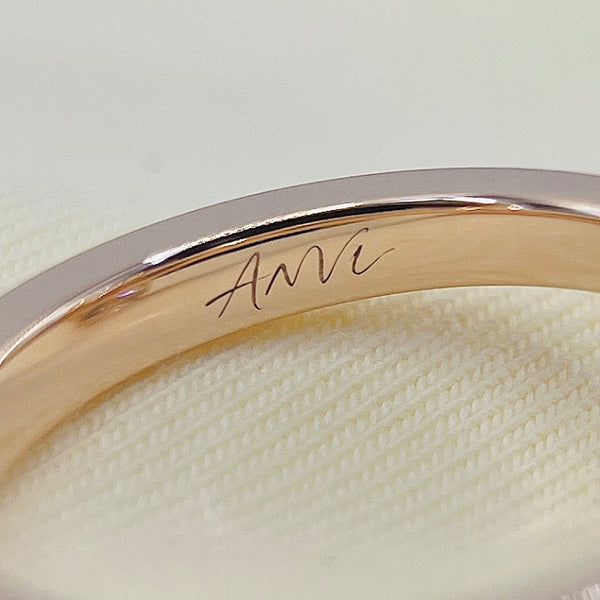 Name in Script engraving, inside the band
