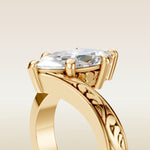 Marquise Bypass Vintage Engraved engagement ring in gold, basket close up