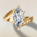 Marquise Bypass Vintage Engraved engagement ring in gold, top view