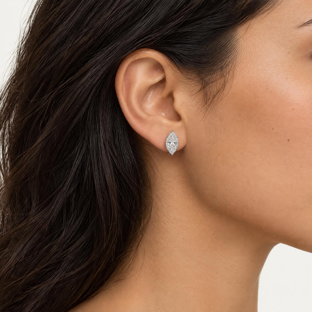 Marquise cut lab grown diamond stud earring worn on the ear