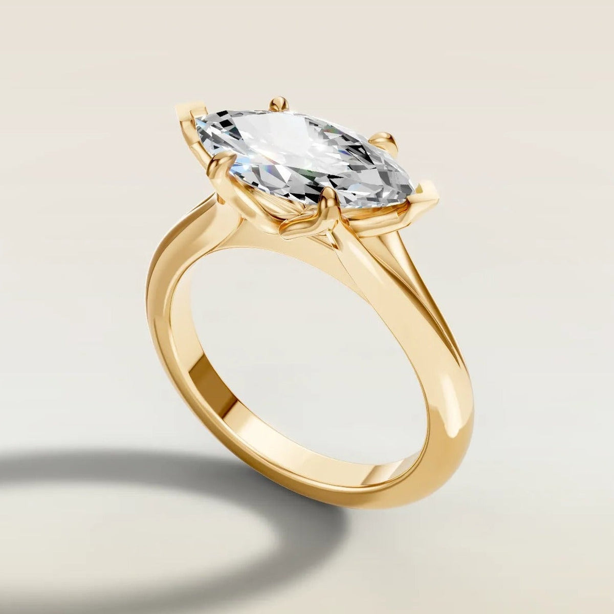 Marquise East West Tulip engagement ring in yellow gold, angled side view