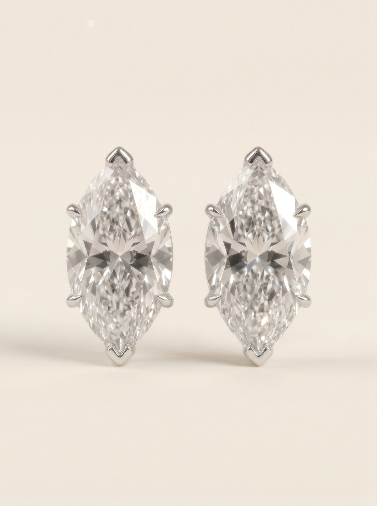 Marquise diamond stud earrings in 14K white gold