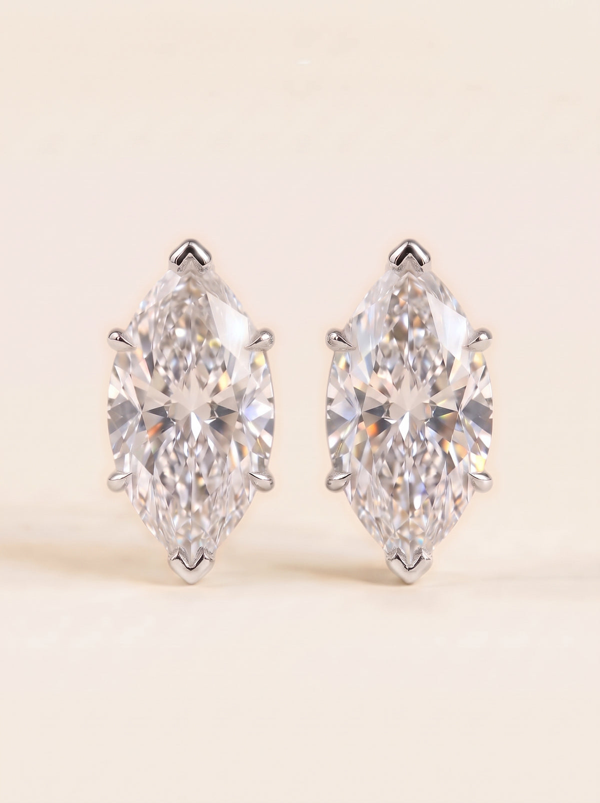 Marquise diamond stud earrings in 14K white gold