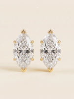 Marquise diamond stud earrings in 14K yellow gold