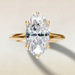 Moval Six Petal Tulip Split Shank engagement ring in yellow gold, top view