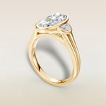 Moval Three Stone Full Bezel engagement ring in yellow gold, back angle
