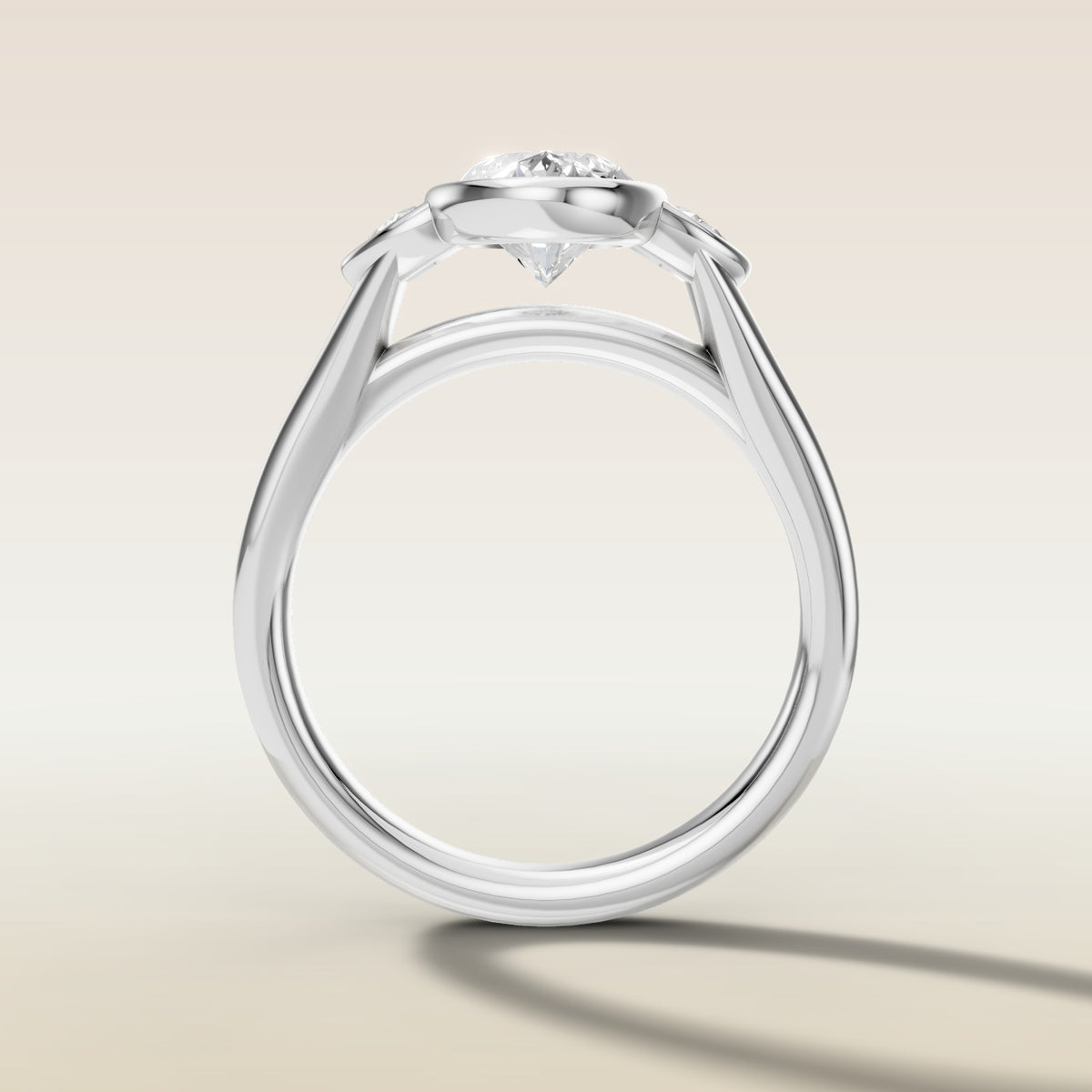 Moval Three Stone Full Bezel engagement ring in white gold, front view