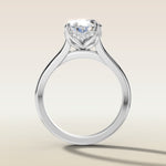 Oval Four Petal Tulip Curved Hidden Halo engagement ring in white gold, front view