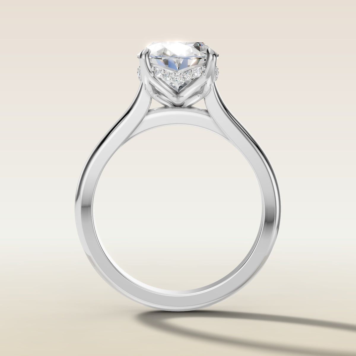 Oval Four Petal Tulip Curved Hidden Halo engagement ring in white gold, front view