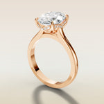 Oval Four Petal Tulip Curved Hidden Halo engagement ring in rose gold, angled side view