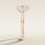 Oval Four Petal Tulip Curved Hidden Halo engagement ring in yellow gold, side profile