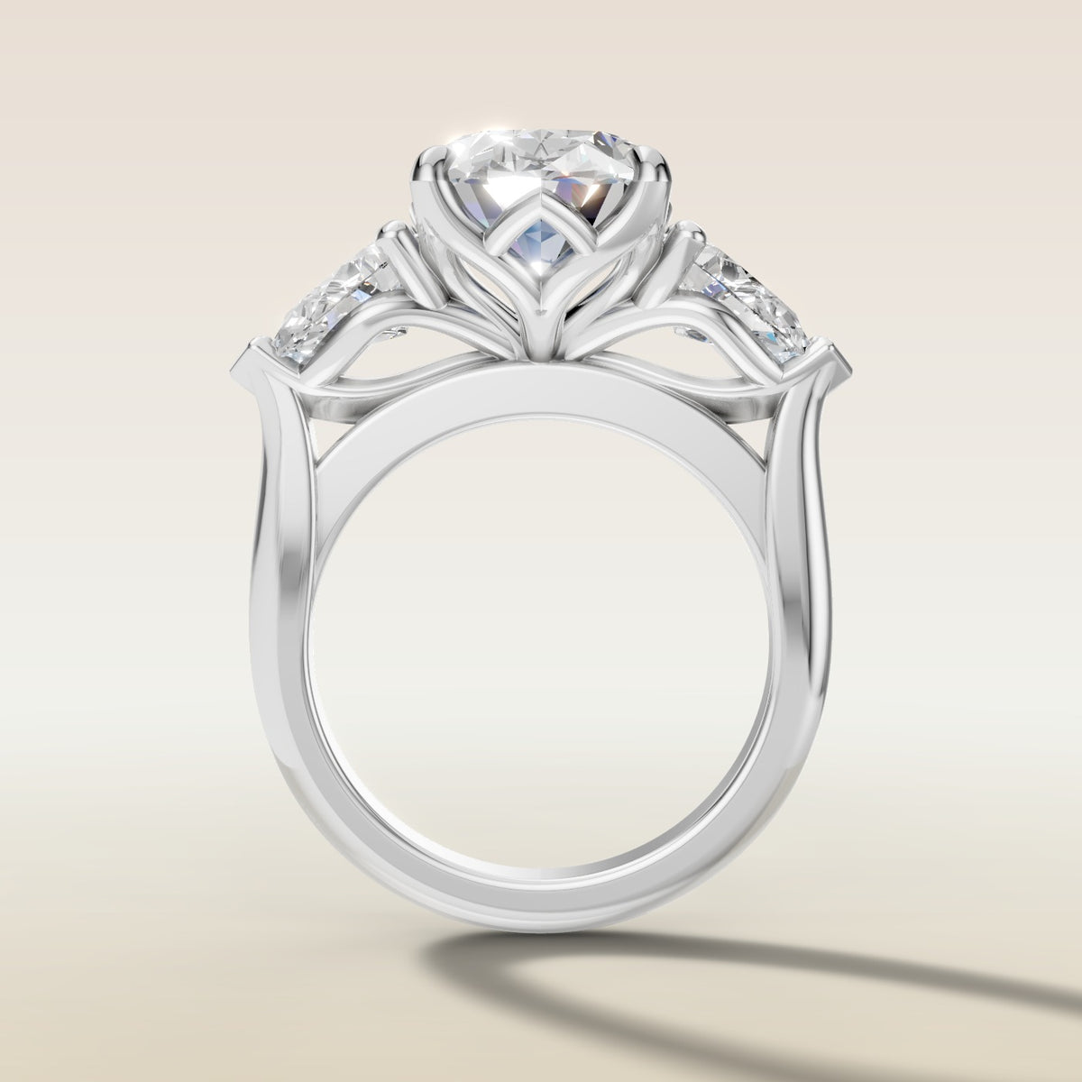 Oval Four Petal Tulip Three Stone engagement ring in white gold, front view