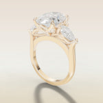 Oval Four Petal Tulip Three Stone engagement ring in yellow gold, angled side view