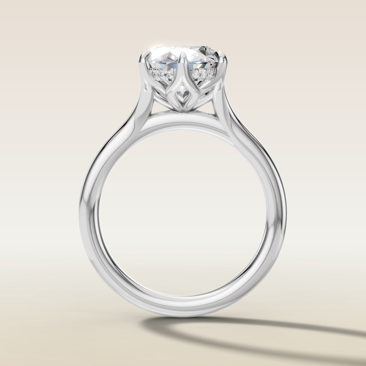 Oval Six Petal Tulip Hidden Halo Split Shank engagement ring in white gold, front view
