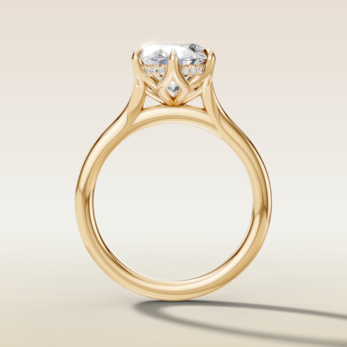 Oval Six Petal Tulip Hidden Halo Split Shank engagement ring in yellow gold, front view