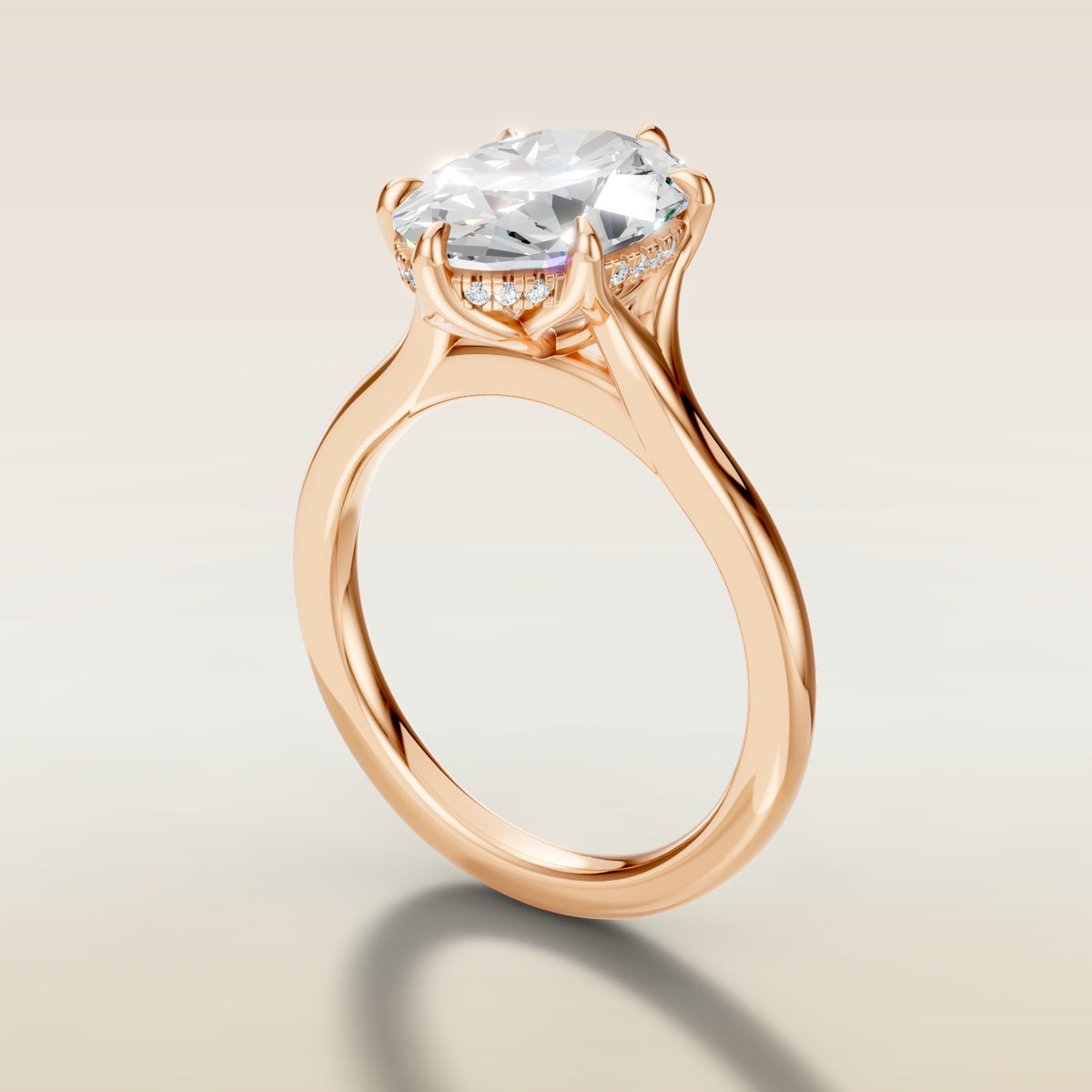 Oval Six Petal Tulip Hidden Halo Split Shank engagement ring in rose gold, angled side view