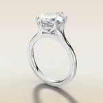 Oval Six Petal Tulip Hidden Halo Split Shank engagement ring in white gold, angled side view