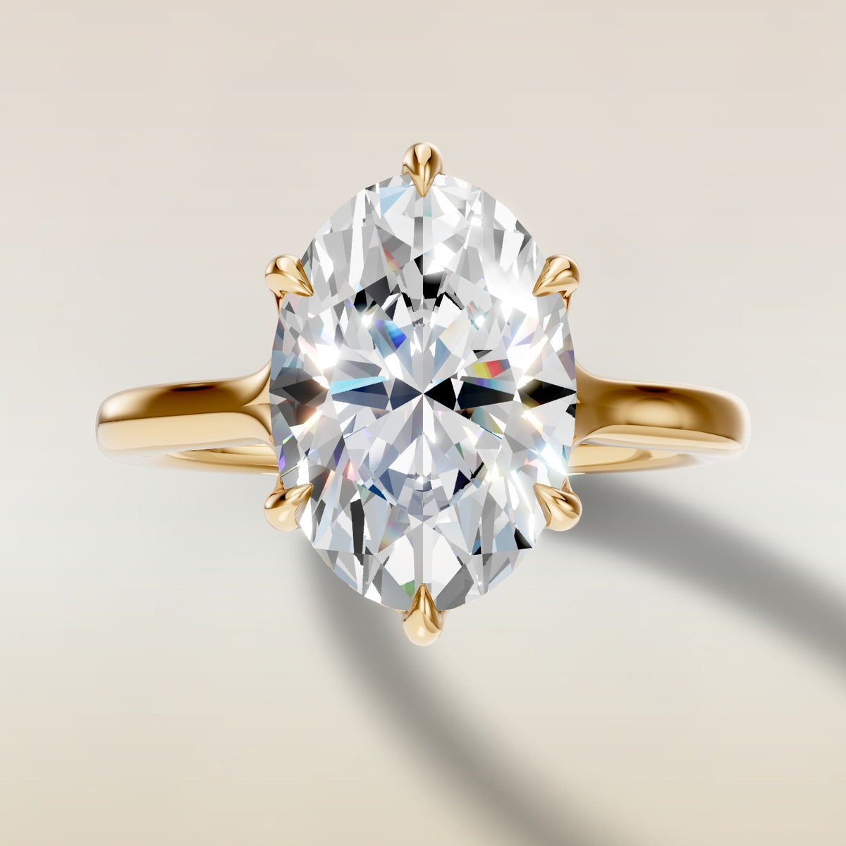 Oval Six Petal Tulip Hidden Halo Split Shank engagement ring in yellow gold, top view
