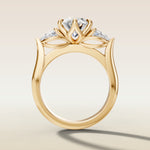 Oval Six Petal Tulip Three Stone engagement ring in yellow gold, front view
